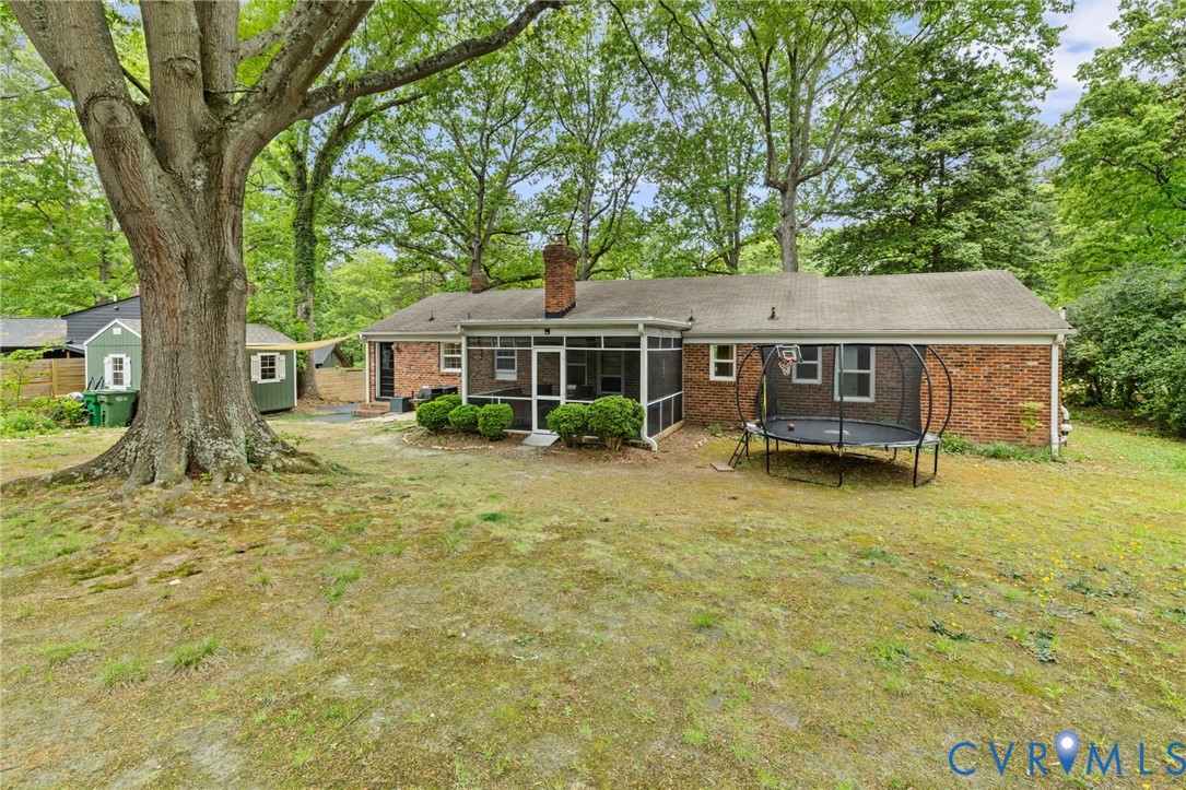 3311 Ottawa Road Richmond, VA 23225 - Photo 27 of 30 front view of a house with a yard table and chairs