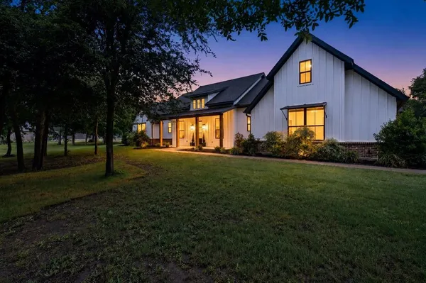 a house view with a garden space