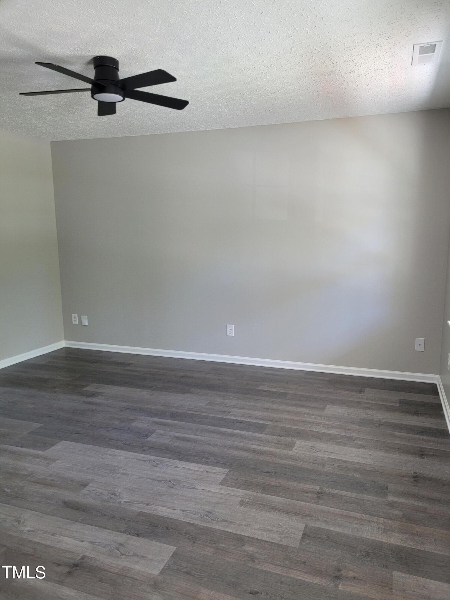 2121 Lime Street Durham, NC 27704 - Photo 3 of 27 a view of a room with wooden floor