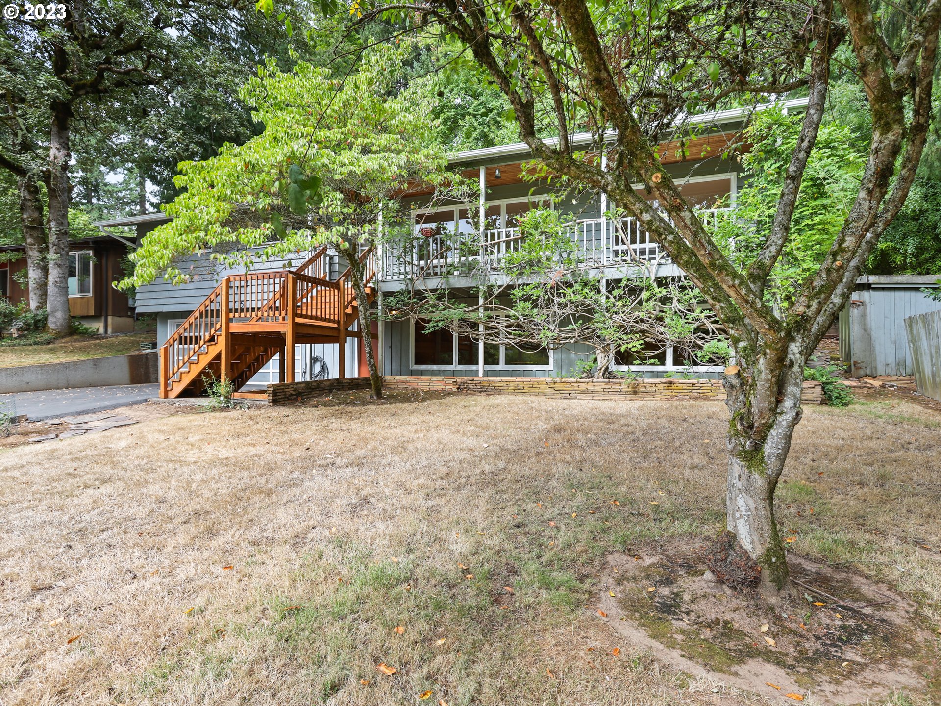 1975 Mapleleaf Road Lake Oswego, OR 97034 - Photo 2 of 37 a view of a house with a yard
