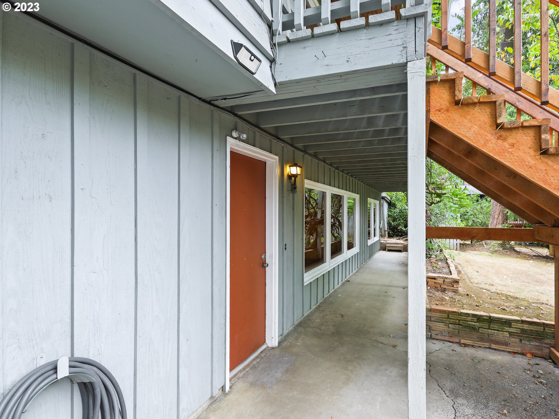 1975 Mapleleaf Road Lake Oswego, OR 97034 - Photo 5 of 37 a view of a porch with a door and a porch
