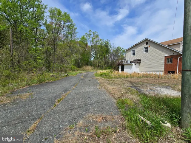 a house view with a outdoor space
