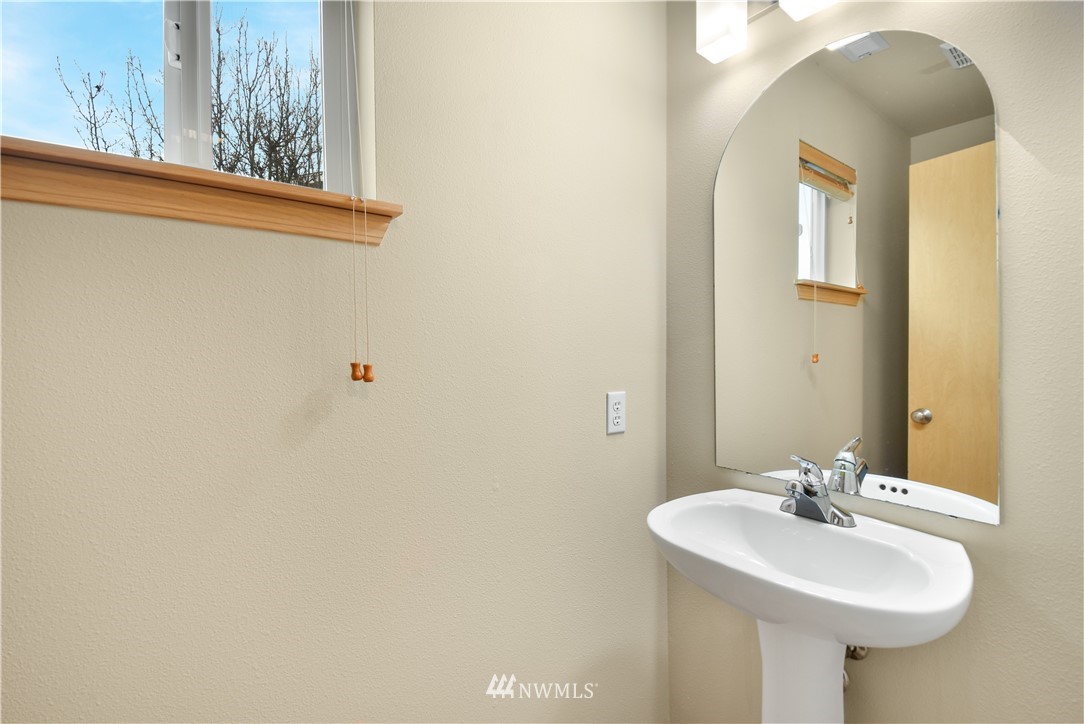 20317 Corbridge Road Southeast Monroe, WA 98272 - Photo 27 of 33 a bathroom with a sink and a mirror