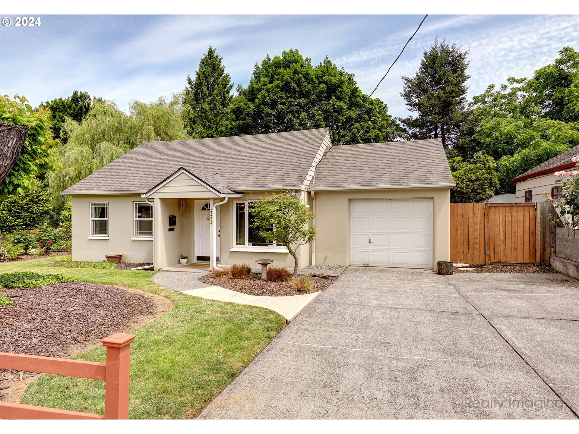 4424 Northeast 115th Avenue Portland, OR 97220 - Photo 1 of 24 a aerial view of a house with a garden and yard
