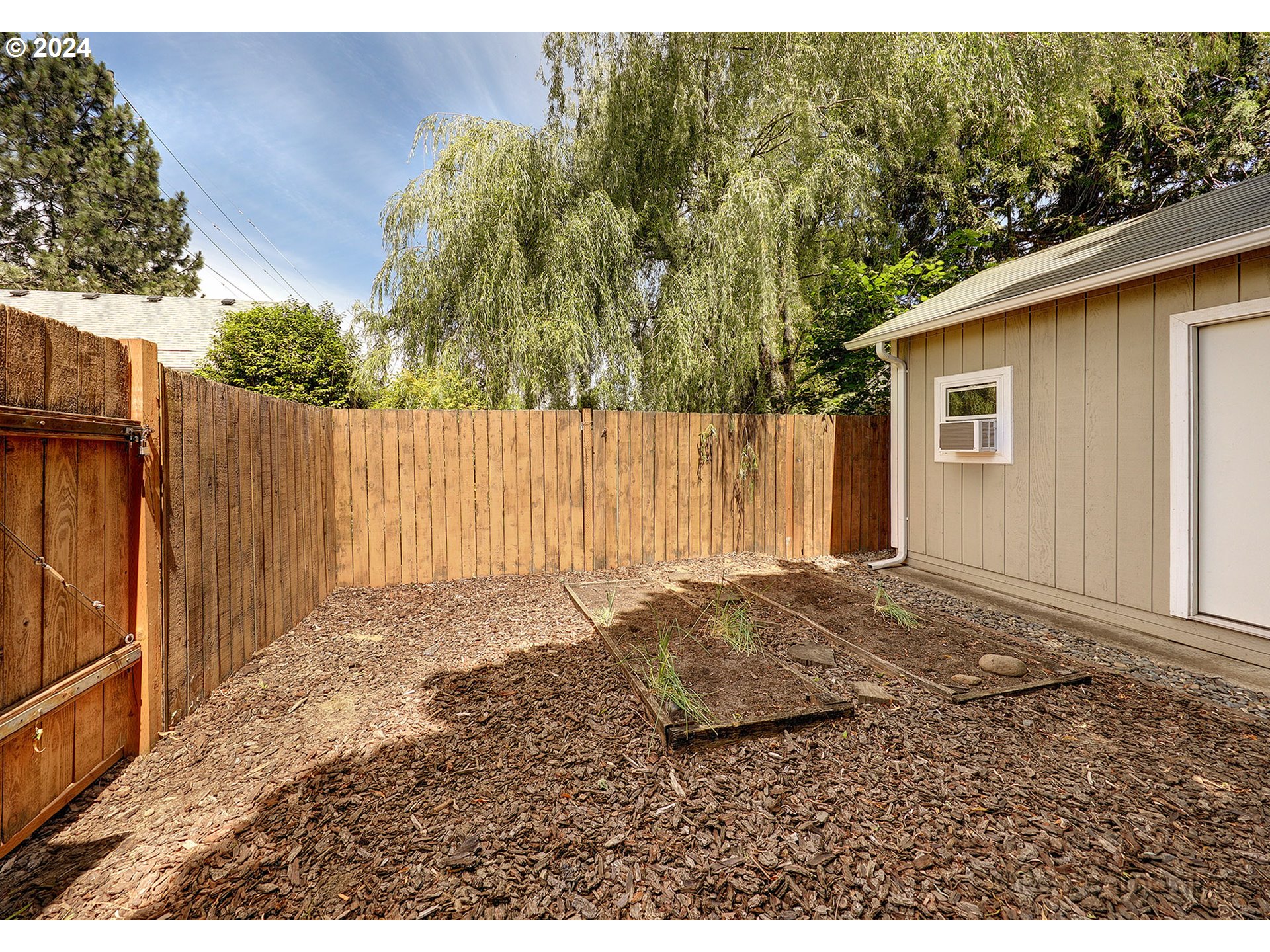 4424 Northeast 115th Avenue Portland, OR 97220 - Photo 19 of 24 a view of backyard of house