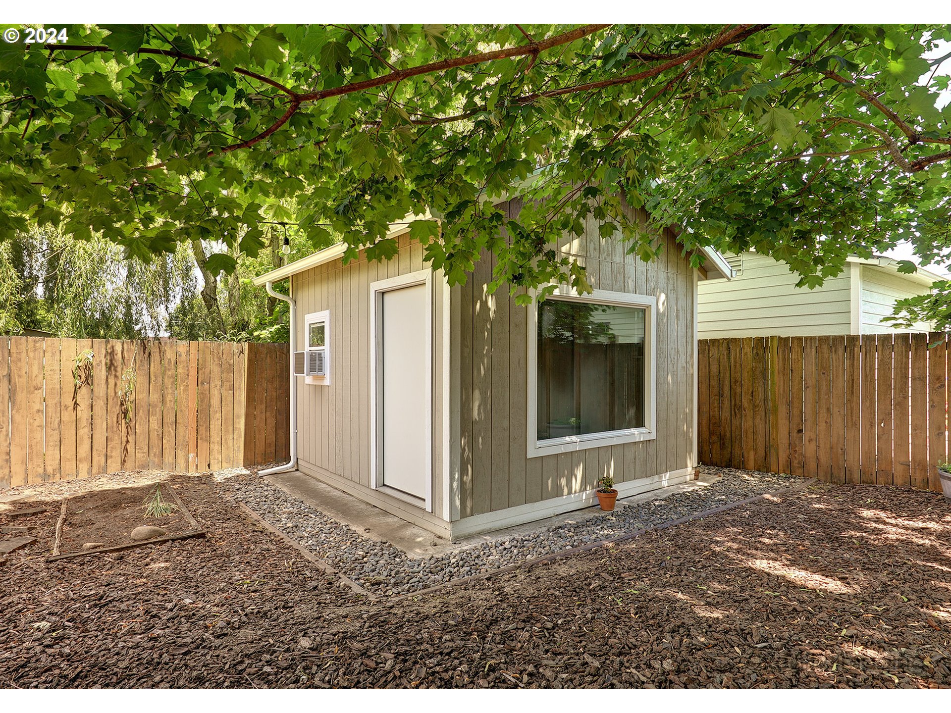 4424 Northeast 115th Avenue Portland, OR 97220 - Photo 20 of 24 a backyard of a house with lots of green space