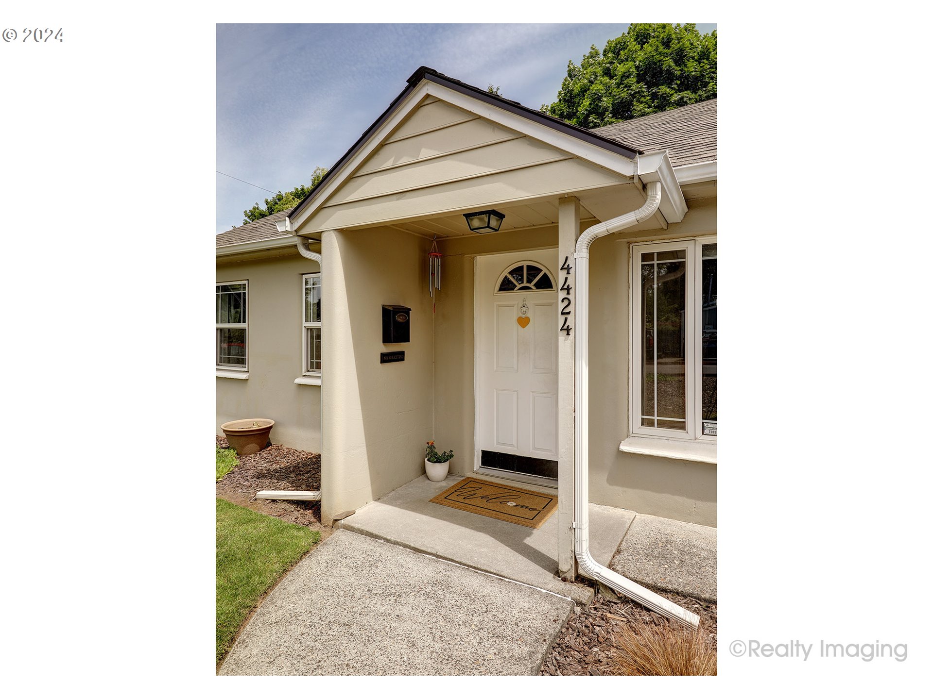 4424 Northeast 115th Avenue Portland, OR 97220 - Photo 5 of 24 a view of a house with backyard