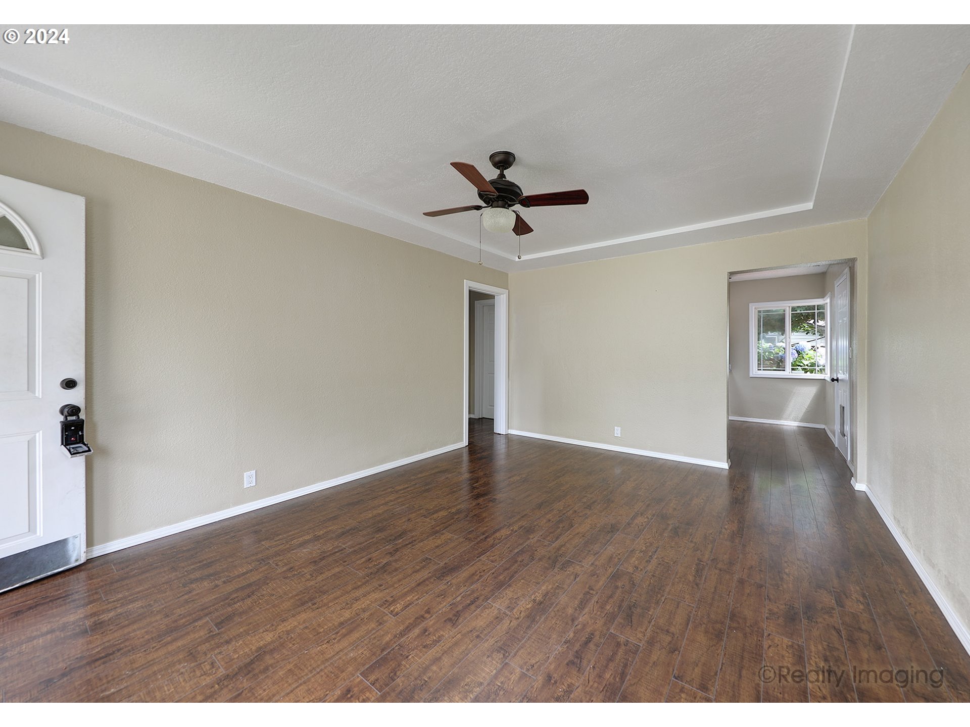 4424 Northeast 115th Avenue Portland, OR 97220 - Photo 8 of 24 a view of empty room with wooden floor