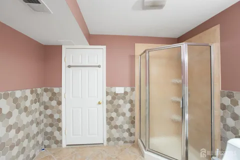 a view of a chair and table on the deck