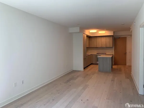 a room with a sink and cabinets
