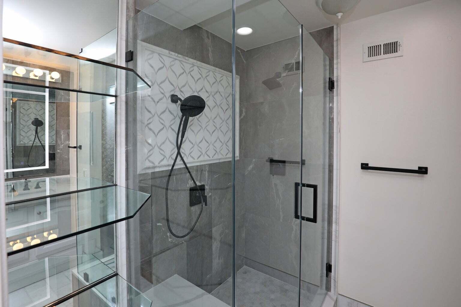 4715 Aragon Drive Carpinteria, CA 93013 - Photo 19 of 29 a bathroom with a glass shower door