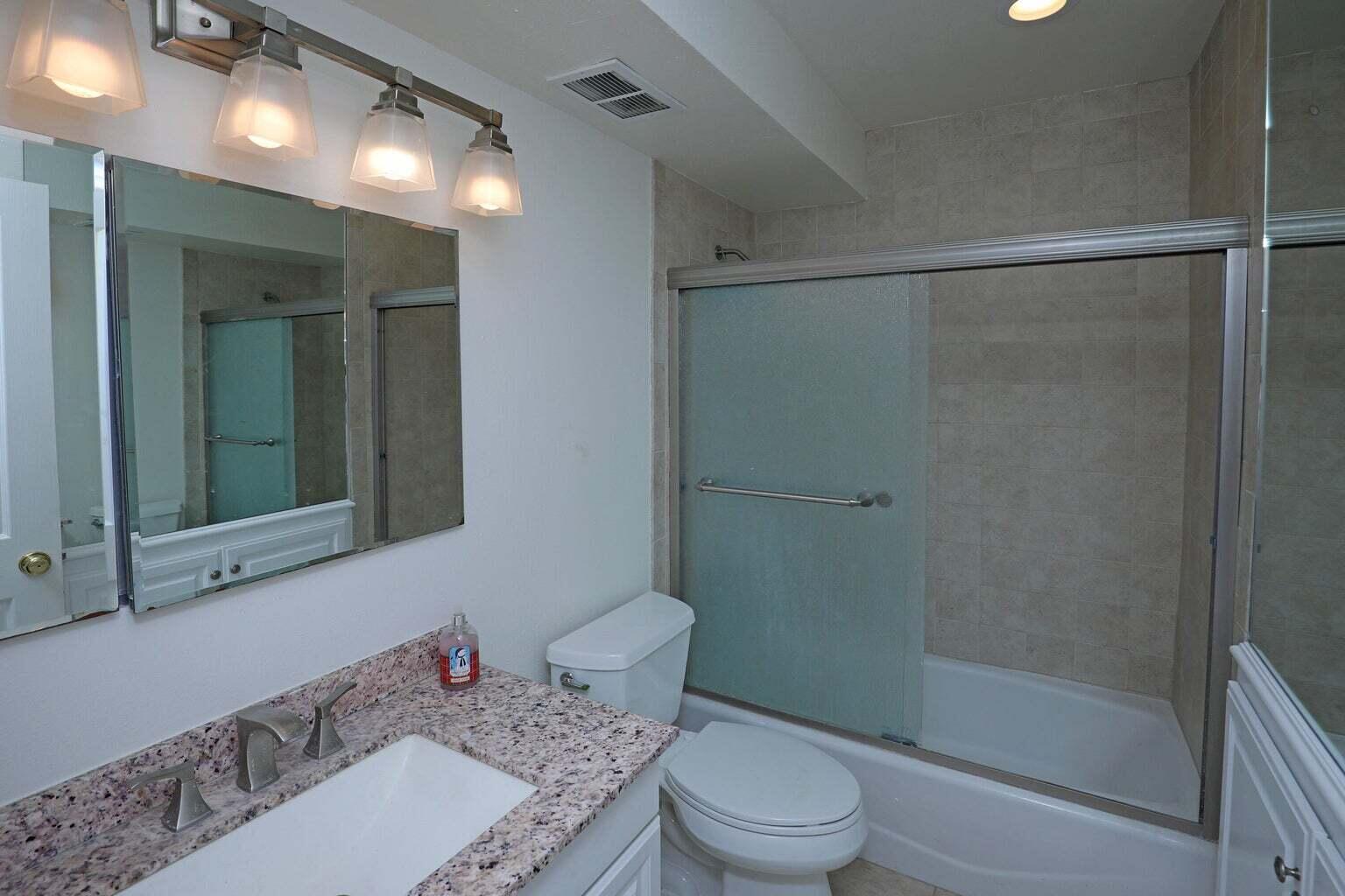 4715 Aragon Drive Carpinteria, CA 93013 - Photo 20 of 29 a bathroom with a sink toilet and shower