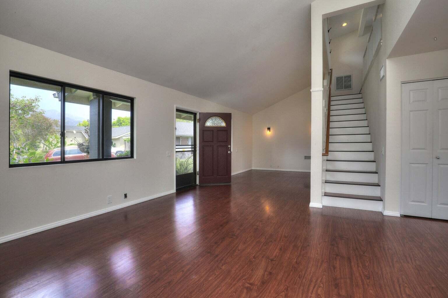 4715 Aragon Drive Carpinteria, CA 93013 - Photo 2 of 29 wooden floor in an empty room with a window