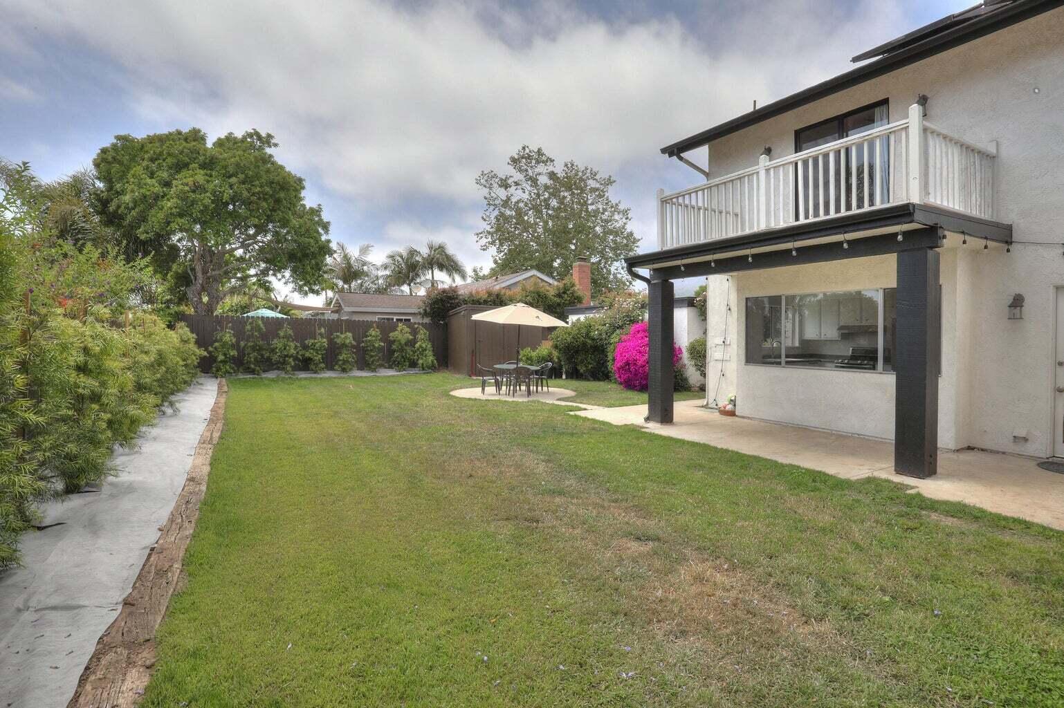 4715 Aragon Drive Carpinteria, CA 93013 - Photo 22 of 29 a view of an house with backyard space and porch