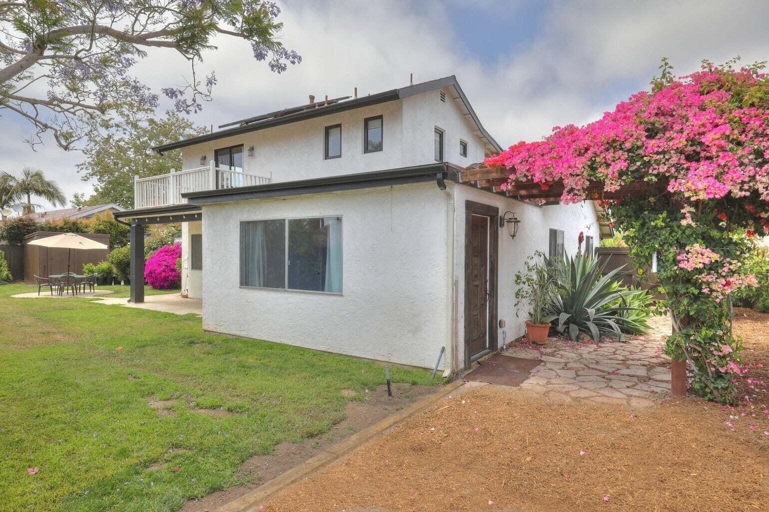 4715 Aragon Drive Carpinteria, CA 93013 - Photo 23 of 29 a front view of a house with a yard