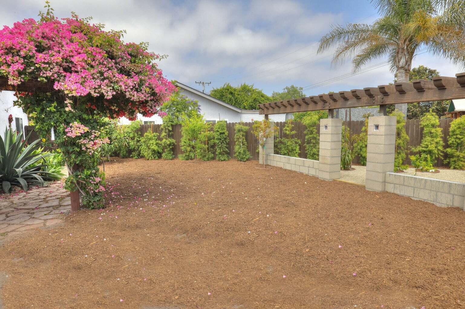 4715 Aragon Drive Carpinteria, CA 93013 - Photo 24 of 29 a view of a street with a flower garden