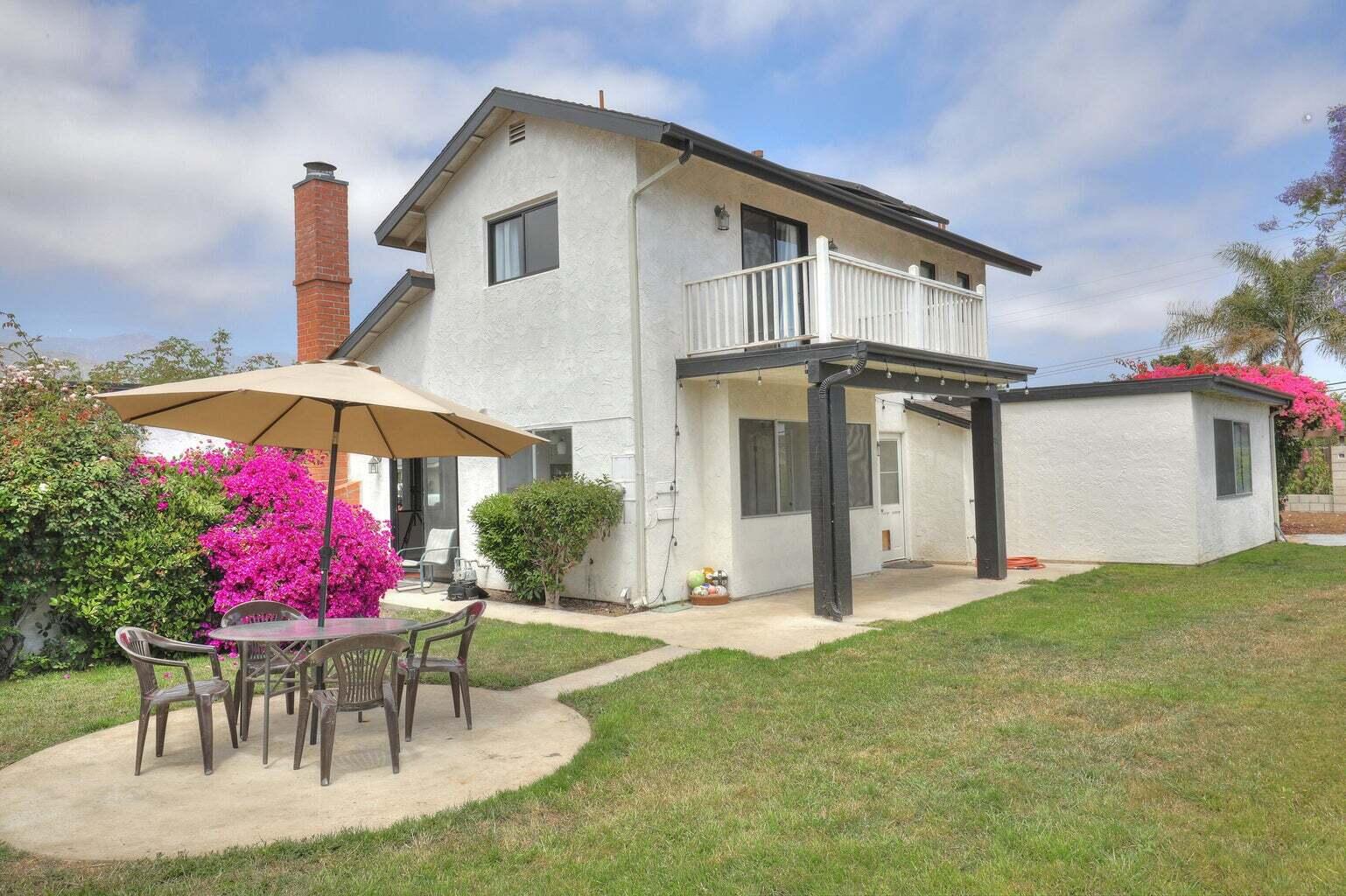 4715 Aragon Drive Carpinteria, CA 93013 - Photo 26 of 29 a view of a house with a yard and sitting area