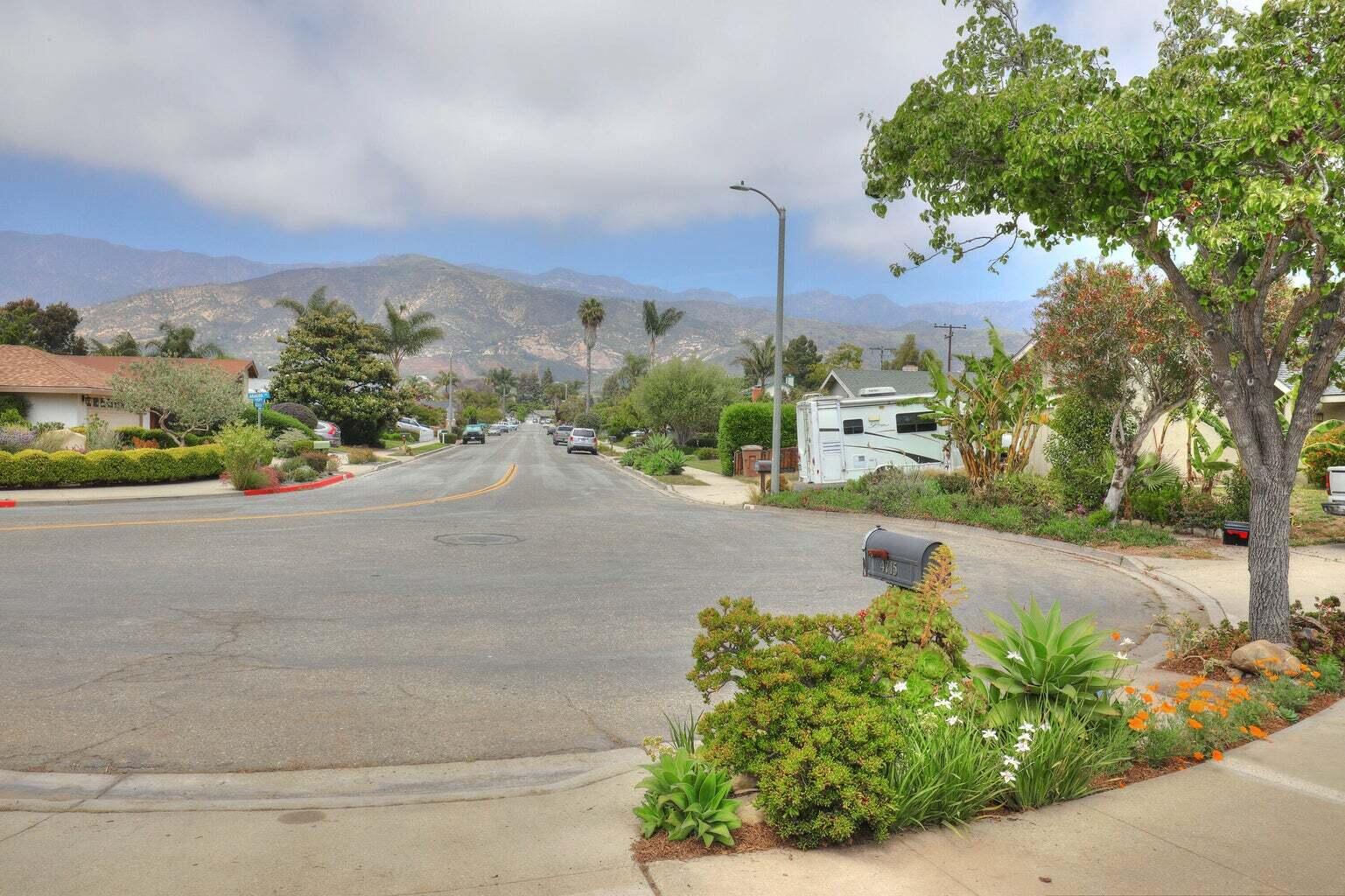 4715 Aragon Drive Carpinteria, CA 93013 - Photo 28 of 29 a street view with large trees