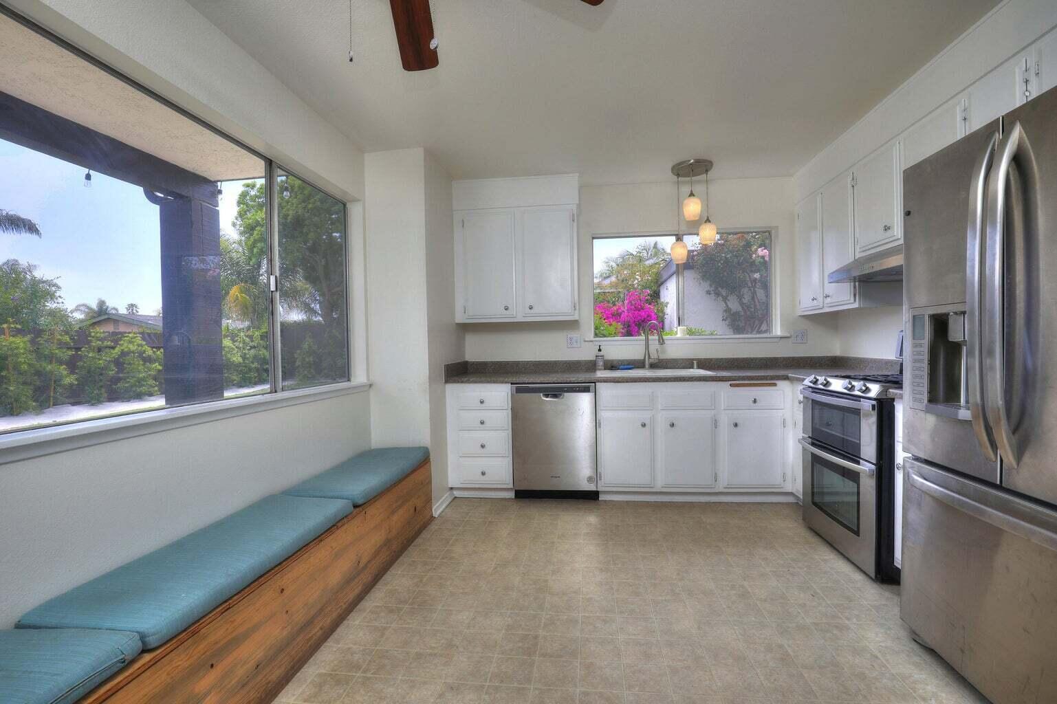 4715 Aragon Drive Carpinteria, CA 93013 - Photo 7 of 29 a kitchen with a sink cabinets and window