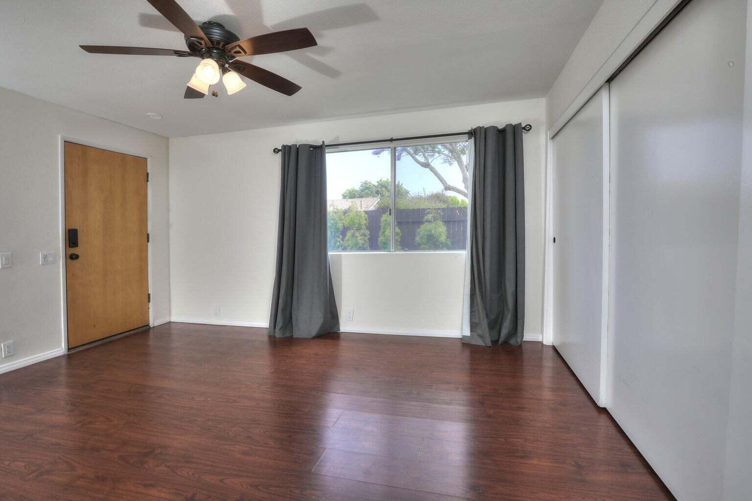4715 Aragon Drive Carpinteria, CA 93013 - Photo 10 of 29 wooden floor in an empty room with a window