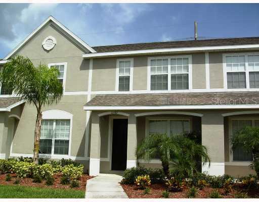 11582 Declaration Drive Tampa, FL 33635 - Photo 1 of 1 a front view of a house with a yard