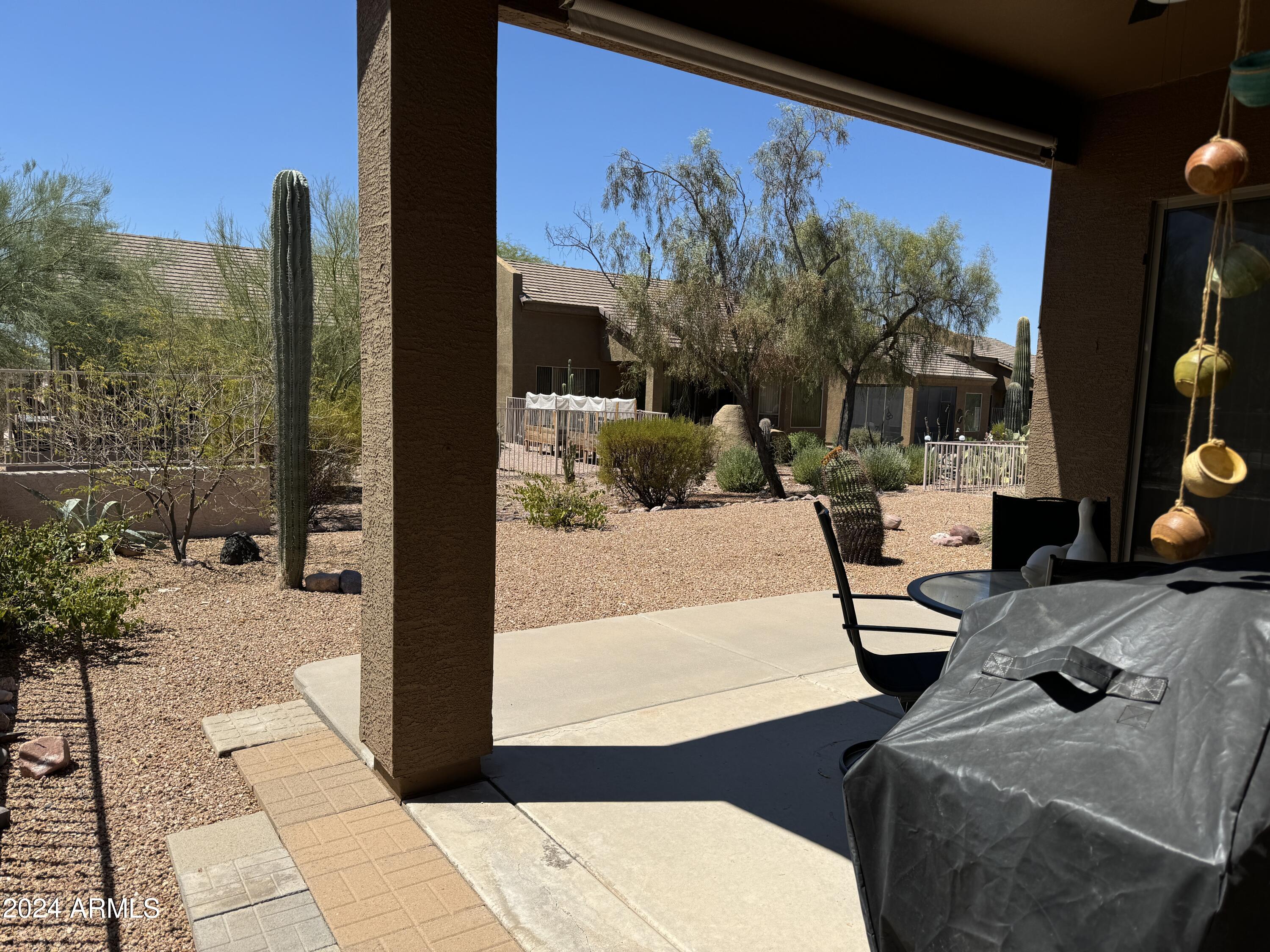 7361 Rugged Ironwood Road Gold Canyon, AZ 85118 - Photo 26 of 52 Backyard backing to wash
