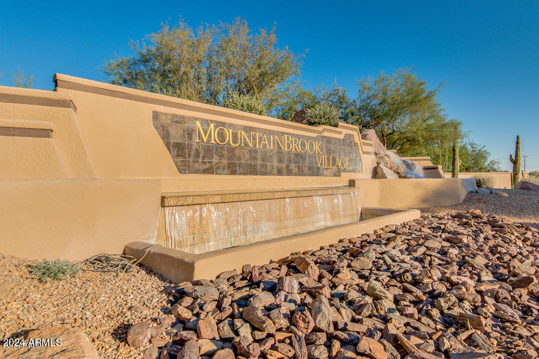 7361 Rugged Ironwood Road Gold Canyon, AZ 85118 - Photo 32 of 52 Mountainbrook Entrance sign with waterfa