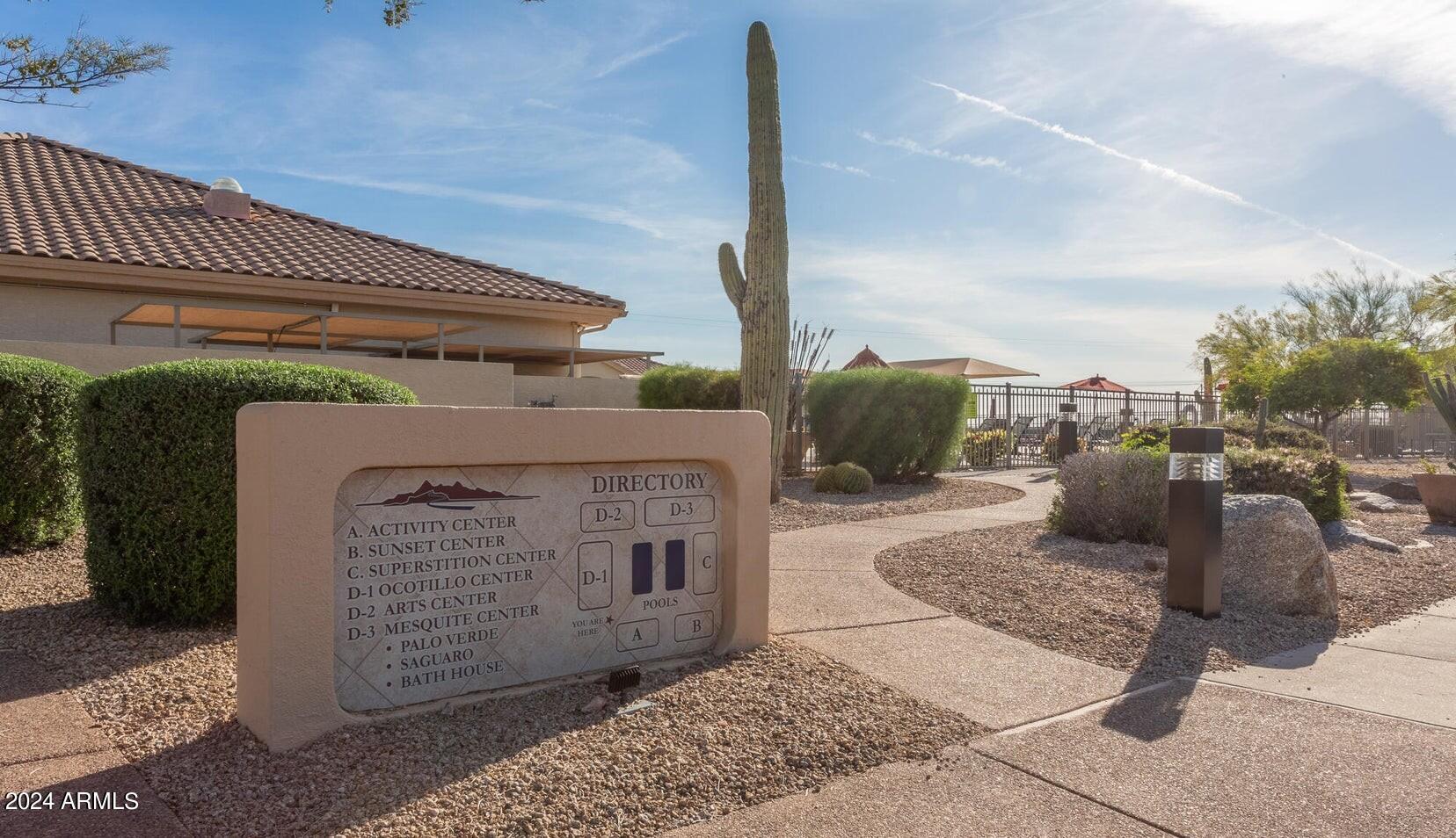 7361 Rugged Ironwood Road Gold Canyon, AZ 85118 - Photo 35 of 52 Walkway to pool by Sign