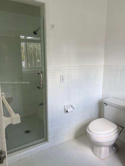 1860 Southwest 4th Avenue Miami, FL 33129 - Photo 11 of 13 a bathroom with a toilet and shower