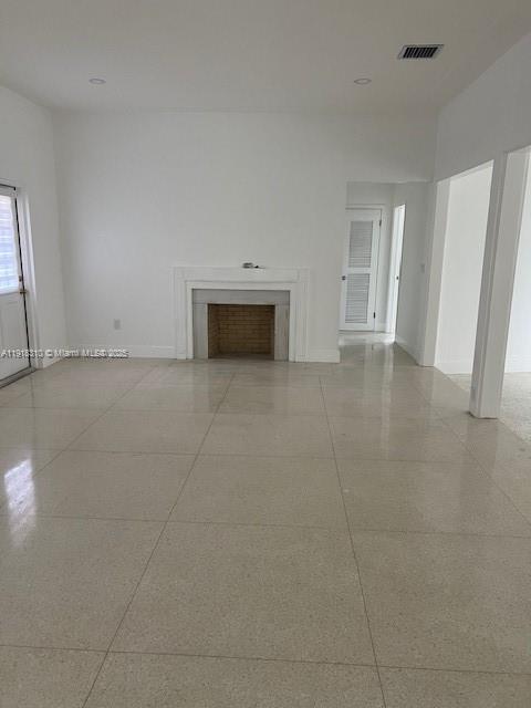 1860 Southwest 4th Avenue Miami, FL 33129 - Photo 6 of 13 an empty room with windows