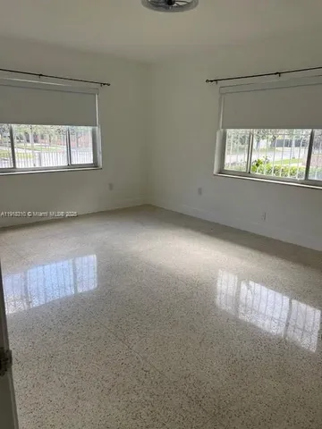 an empty room with a window