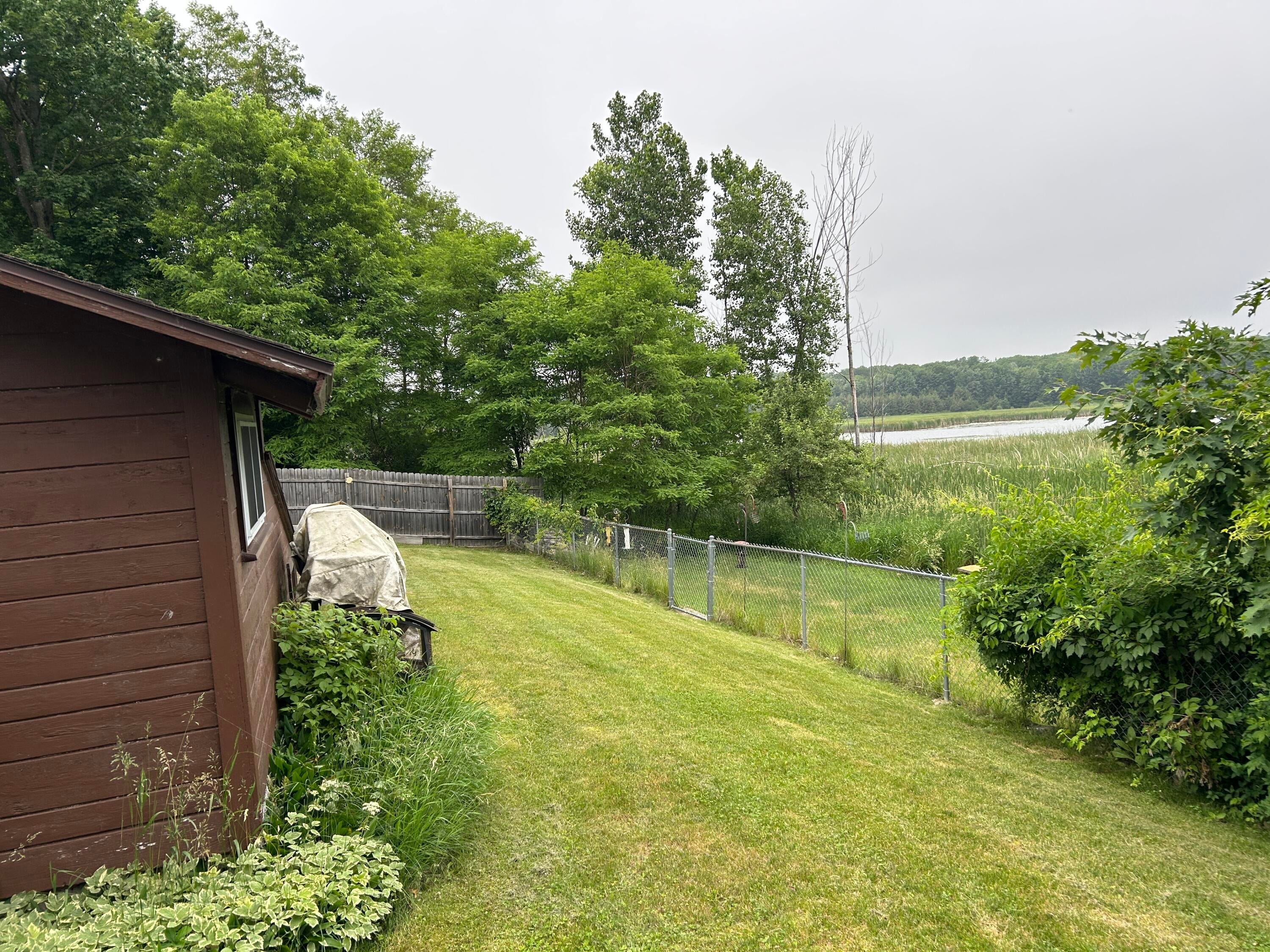 410 West Traverse Bay State Road Lincoln, MI 48742 - Photo 3 of 38 Fenced area - great for pets