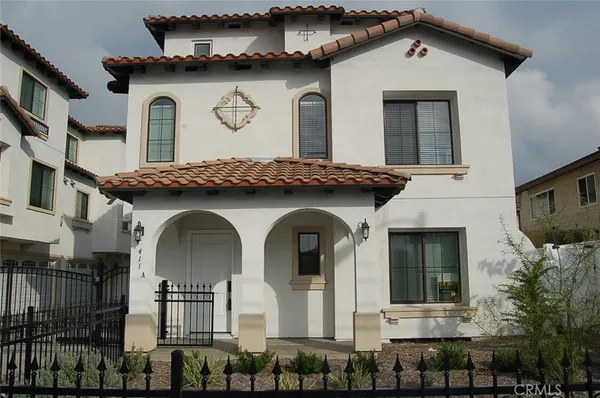 a front view of a house with windows