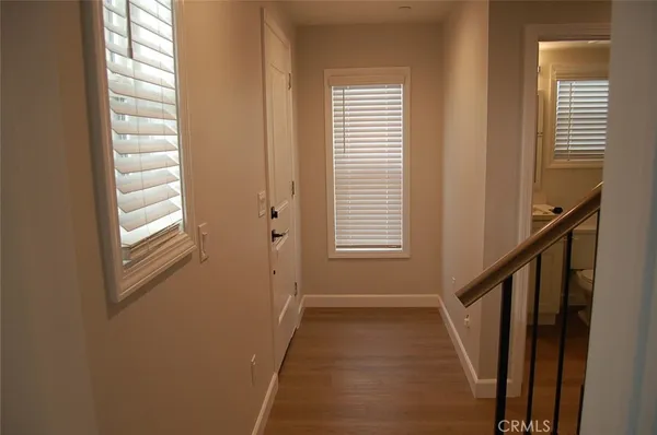 a view of a room with windows
