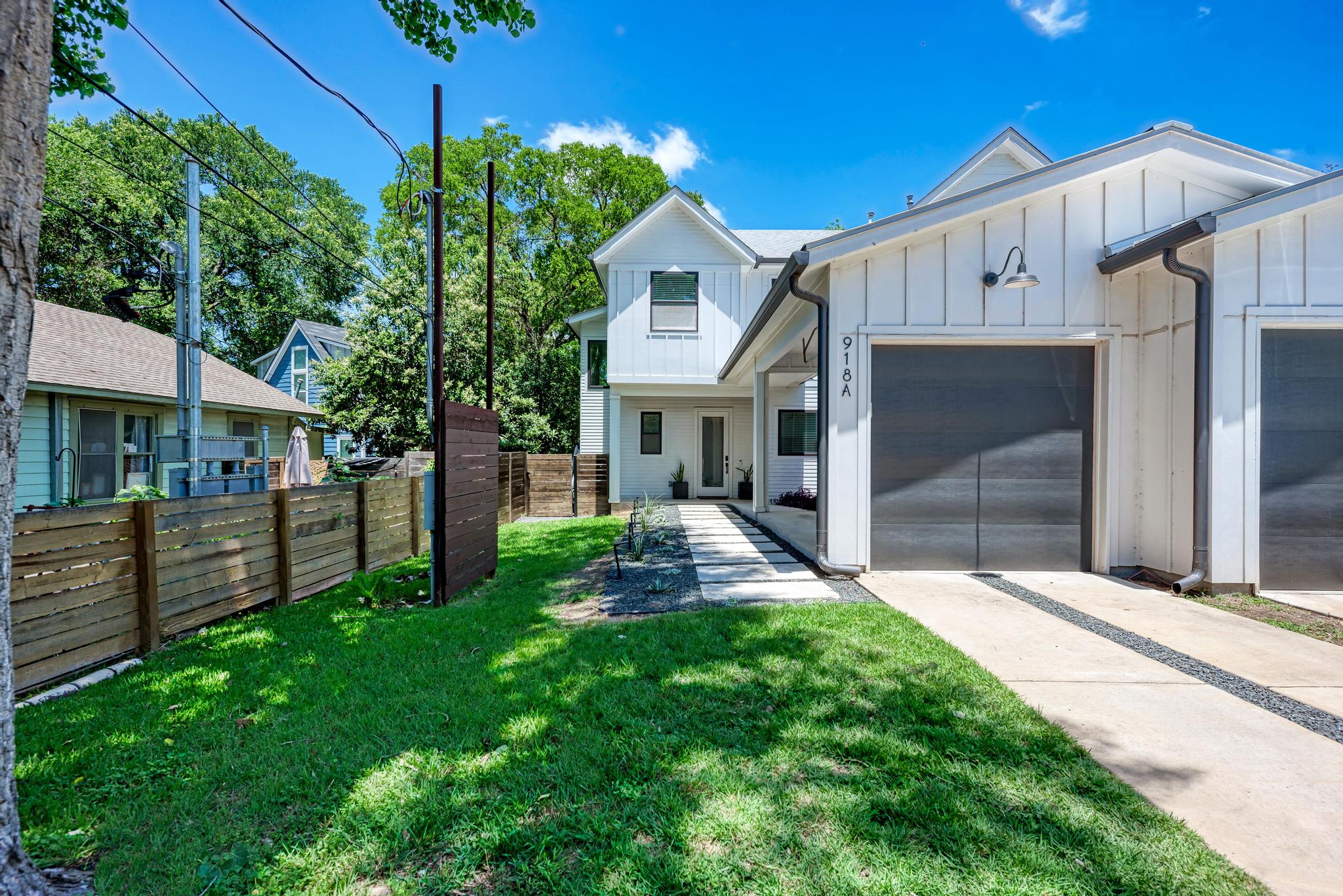 918 Cardinal Lane, Unit A Austin, TX 78704 - Photo 34 of 40 Strategic fencing maintains privacy while professional landscaping provides excellent curb appeal.
