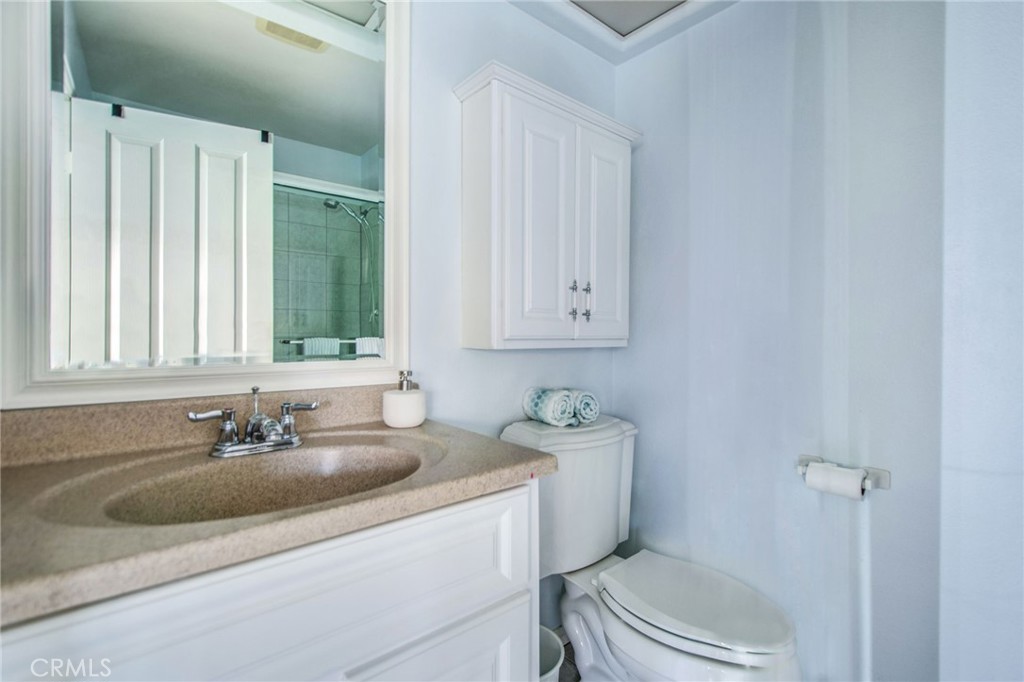 36 Cameray Heights Laguna Niguel, CA 92677 - Photo 12 of 27 a bathroom with a sink toilet and shower