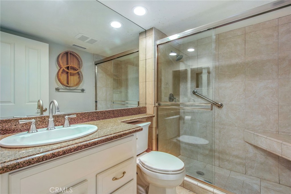 36 Cameray Heights Laguna Niguel, CA 92677 - Photo 13 of 27 a bathroom with a granite countertop sink toilet and shower