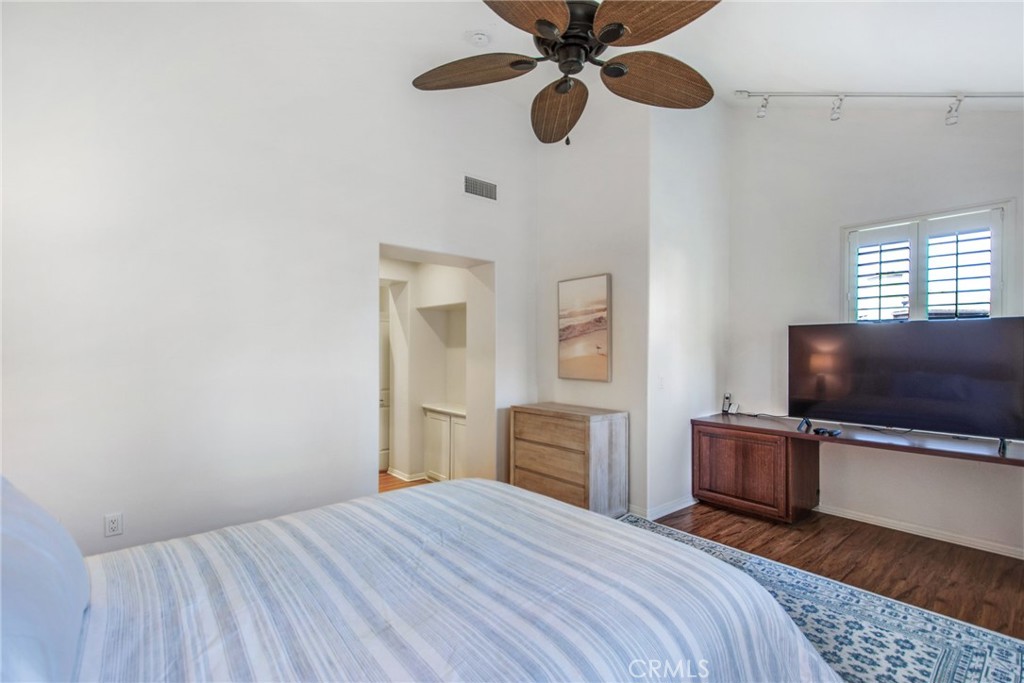 36 Cameray Heights Laguna Niguel, CA 92677 - Photo 19 of 27 a bedroom with a bed and a flat screen tv