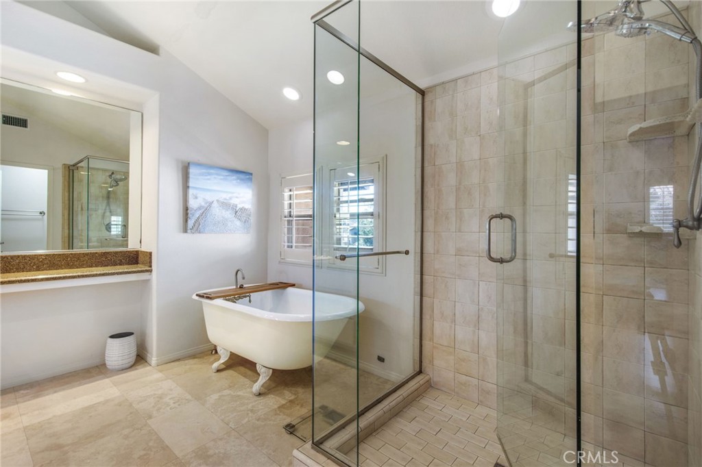 36 Cameray Heights Laguna Niguel, CA 92677 - Photo 20 of 27 a spacious bathroom with a shower sink and mirror