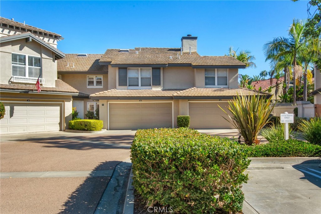 36 Cameray Heights Laguna Niguel, CA 92677 - Photo 23 of 27 a front view of a house with a garden