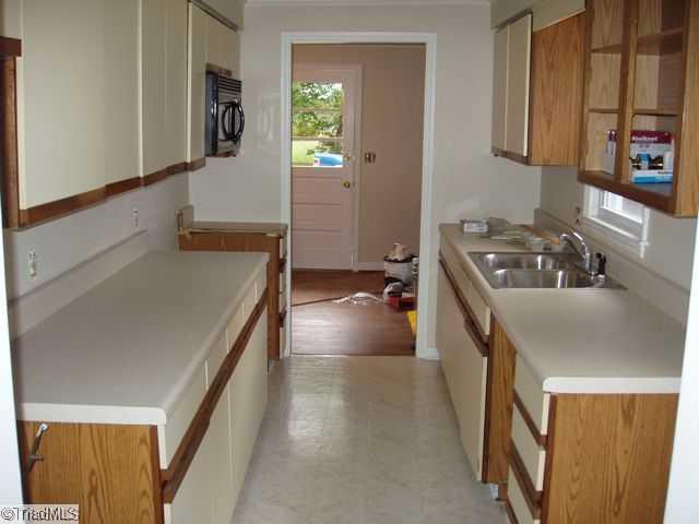 5321 Reidsville Road Walkertown, NC 27051 - Photo 5 of 6 Kitchen. Cozy Kitchen just off the Dining Room.
