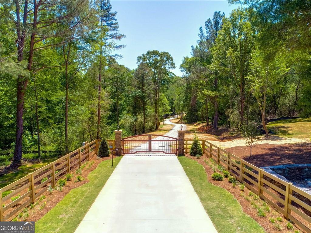 406 Mulberry Road Winder, GA 30680 - Photo 1 of 1 Beautiful gated entry on Mulberry Road.