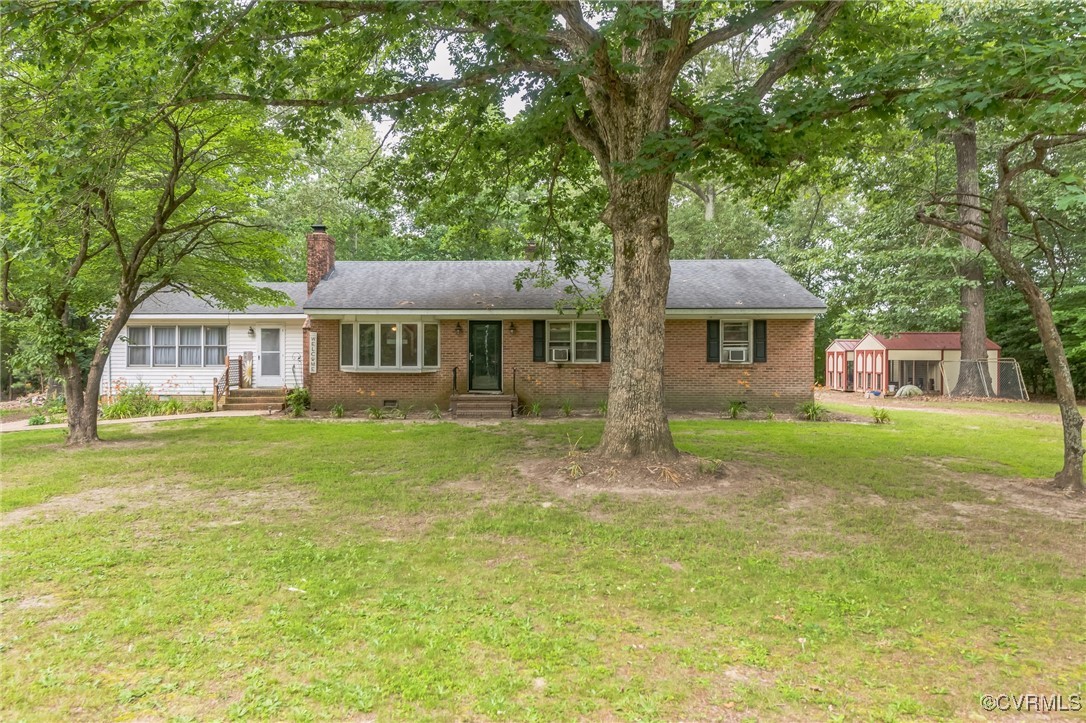 1305 Pea Rdg Road Bruington, VA 23023 - Photo 1 of 32 Ranch-style house with brick siding, a chimney, an