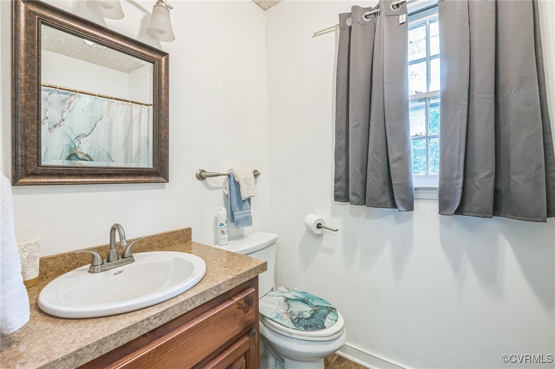 1305 Pea Rdg Road Bruington, VA 23023 - Photo 13 of 32 Full bath featuring toilet and vanity