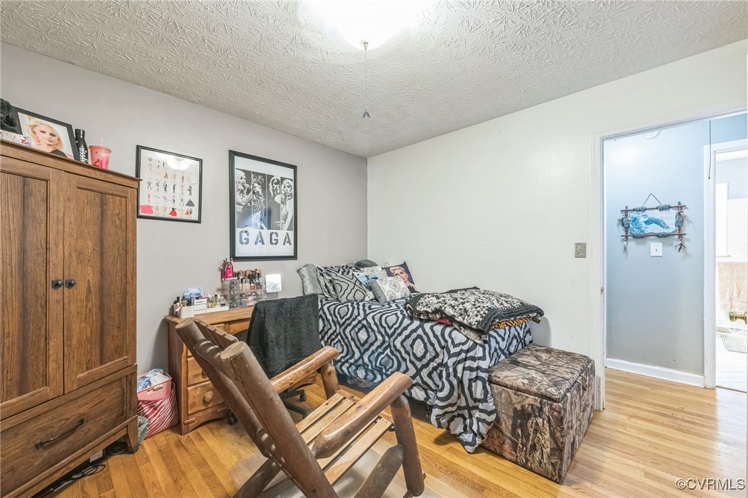 1305 Pea Rdg Road Bruington, VA 23023 - Photo 15 of 32 Bedroom featuring light wood-style flooring and a
