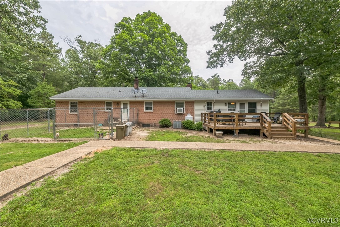 1305 Pea Rdg Road Bruington, VA 23023 - Photo 23 of 32 Rear view of property featuring a wooden deck, bri