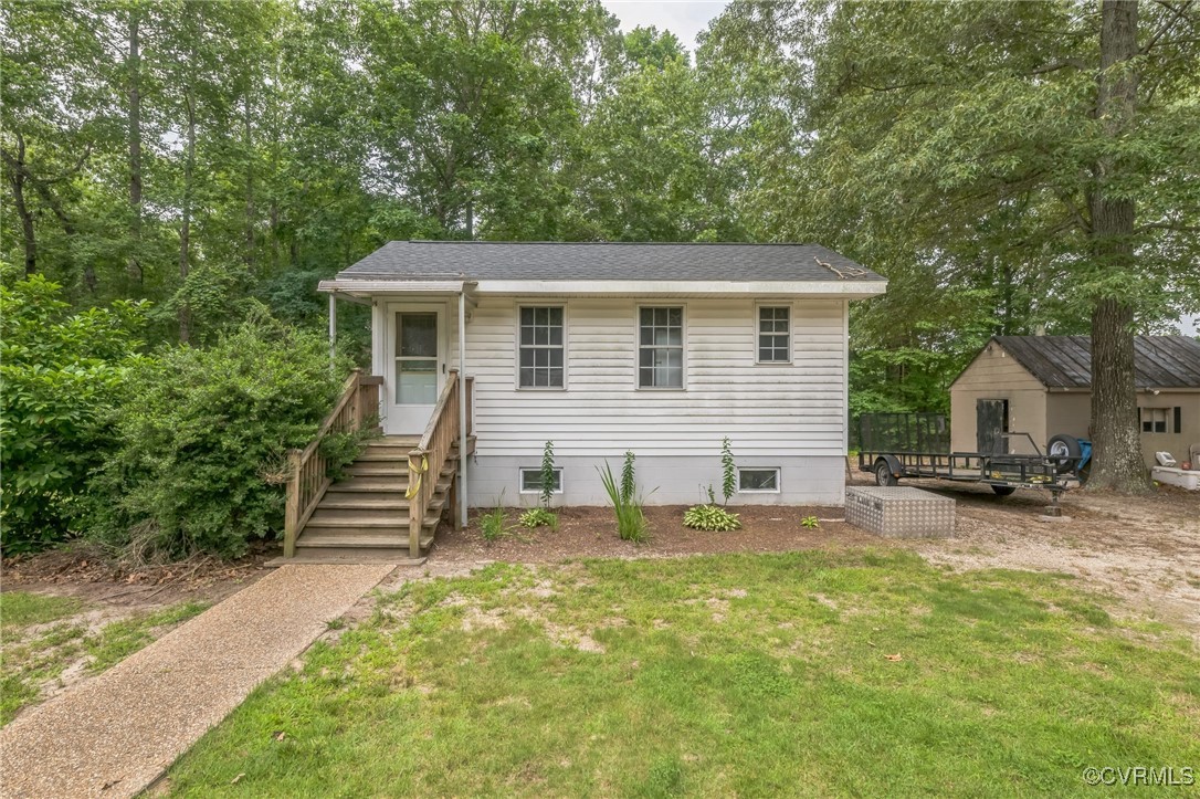 1305 Pea Rdg Road Bruington, VA 23023 - Photo 26 of 32 View of front of property featuring a front lawn,