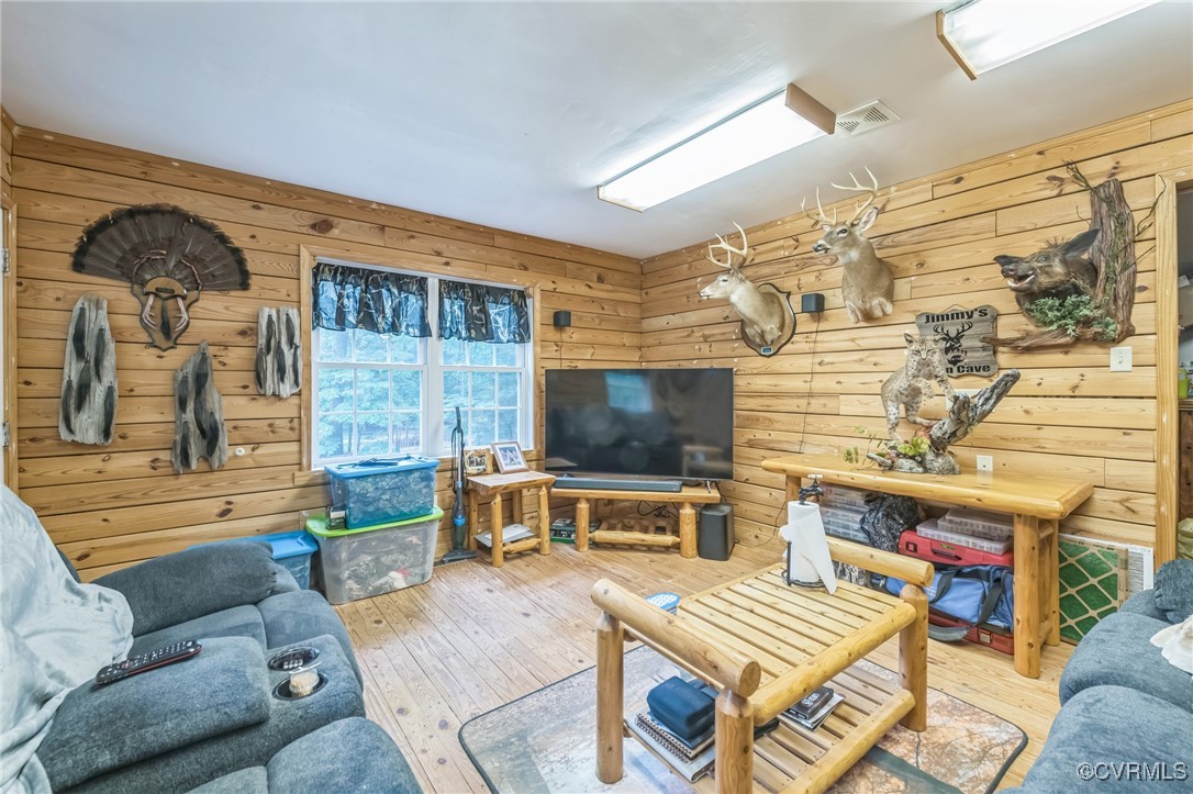 1305 Pea Rdg Road Bruington, VA 23023 - Photo 27 of 32 Living room with hardwood / wood-style flooring an
