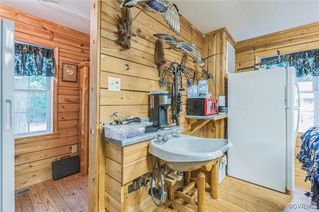 1305 Pea Rdg Road Bruington, VA 23023 - Photo 28 of 32 Bathroom with wood finished floors, plenty of natu