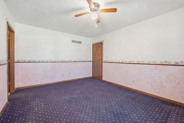 a view of a room with an empty space
